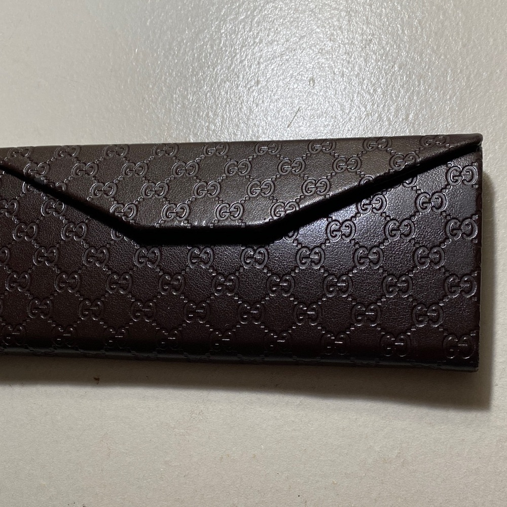 Gucci Dark Brown Logo Embossed Case